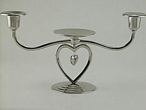 Unity Candle CG19450 - This Unity Candle holder has a hanging heart within a heart.