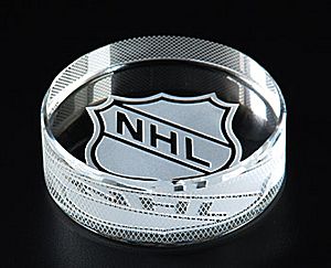 Hockey Puck PrismC609 - High quality optical crystal.
Avail. 10 days to 2 weeks.
when Puck is not engraved, it makes an excellent base for other glass trophies.