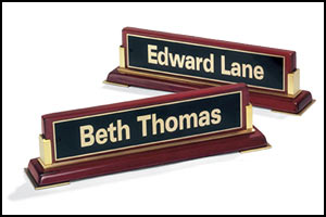 588 - Rosewood piano-finish nameplate with gold metal accents