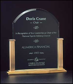 A6555 - acrylic award on a gold metal base with square columns.
