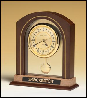 bc922 - Arched pendulum clock with walnut and burl finish, three hand movement
