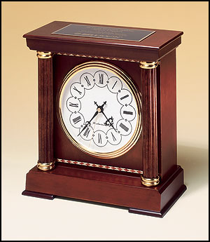 bc902 - Mantle clock, deep hand-rubbed  mahogany finish with decorative wood inlay and two columns