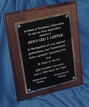 silver border plaque - solid walnut stained board with aluminum border and black aluminum plate.  Sizes start at 7X9 in.